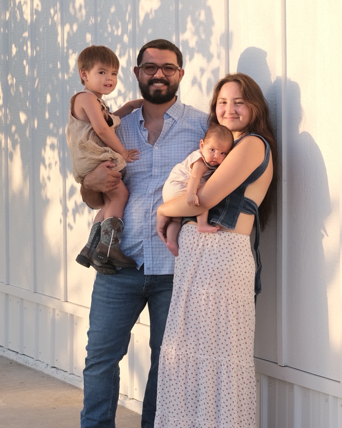 Cesar Rios with his wife and two sons